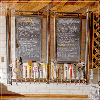 Hanging Draft Beer Towers With Beers On Tap